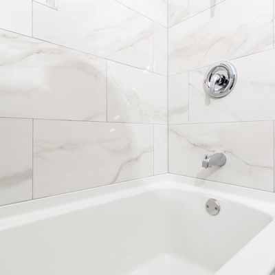 Shower with glass panel