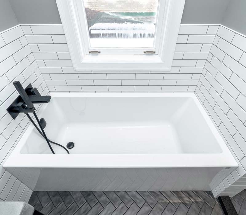 Mr. Bath Team picture with a client