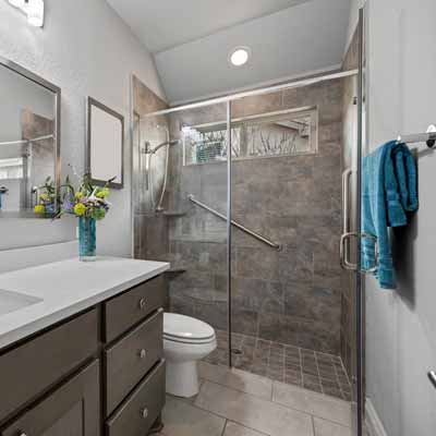 Shower with glass panel